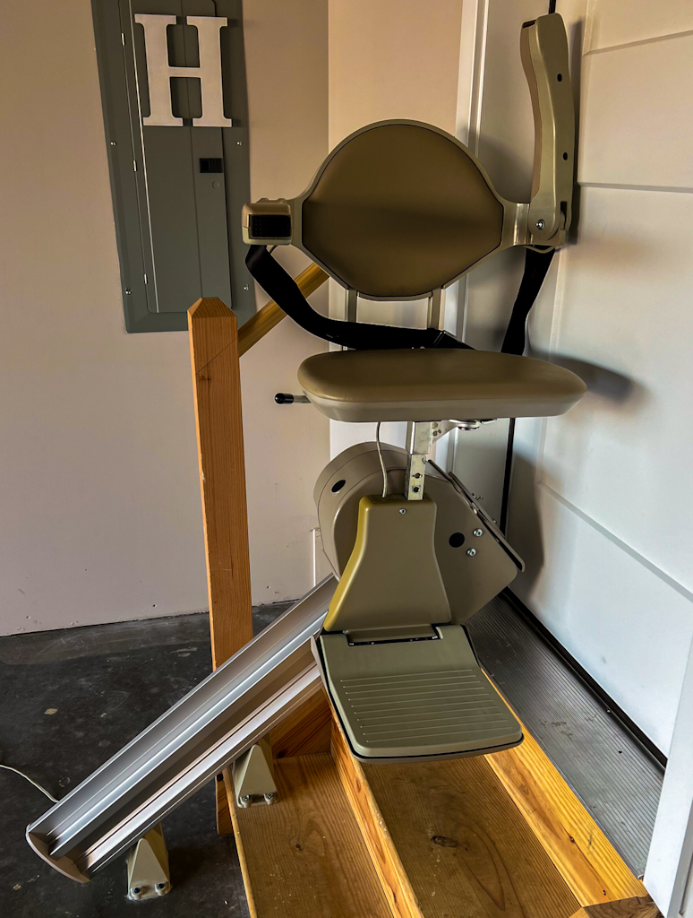 Photo of a stair lift installed in a garage in Lancaster